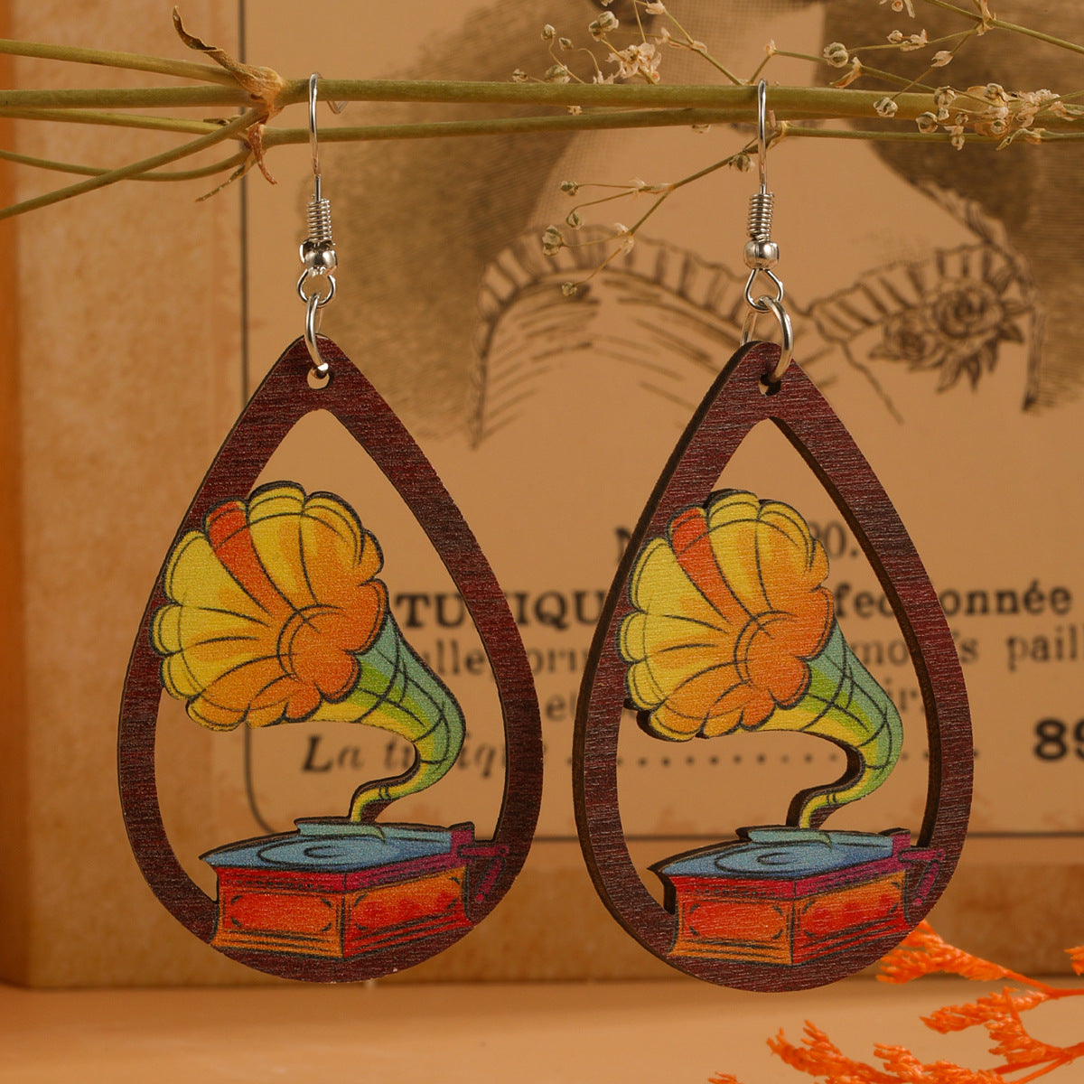 Guitarra de agua de agua al por mayor arpa acordeón estampado de madera aretes de madera