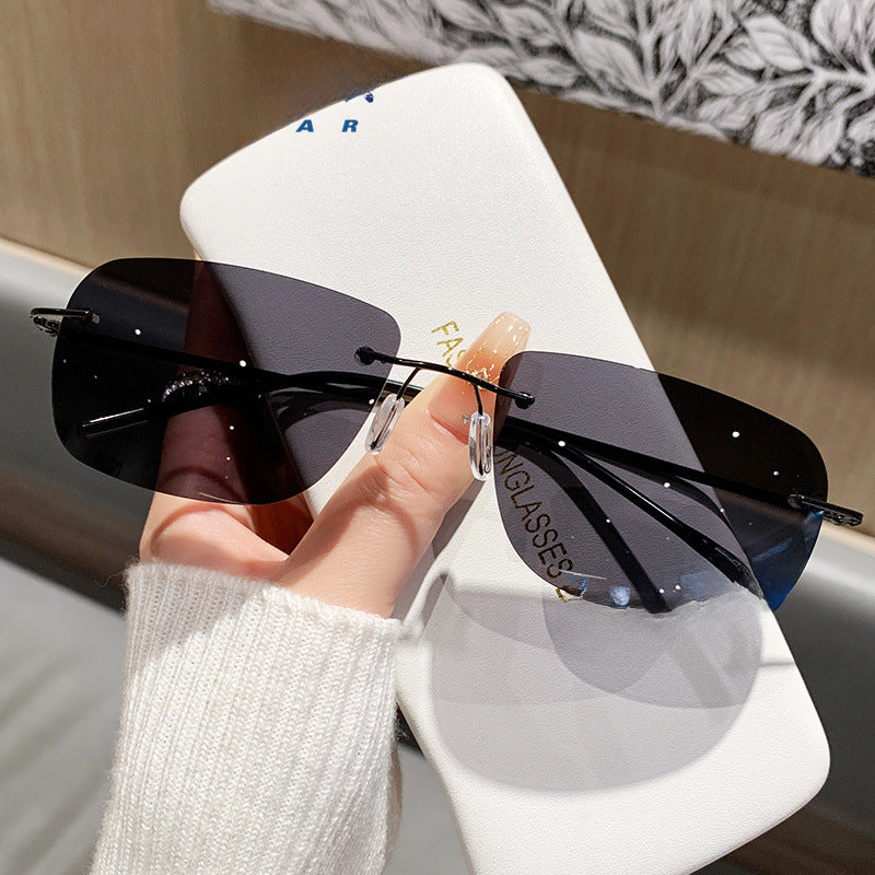 Wholesale Fashionable ultra-light high-end frameless trimmed sunglasses