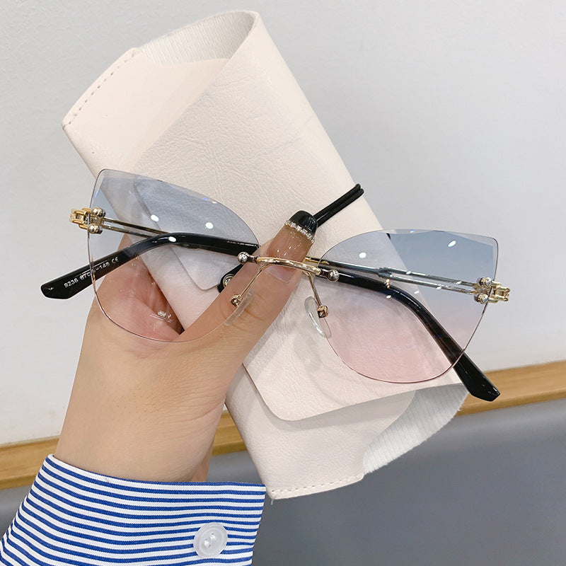 Wholesale Retro frameless cut-edge sunglasses cat-eye gradient sunglasses