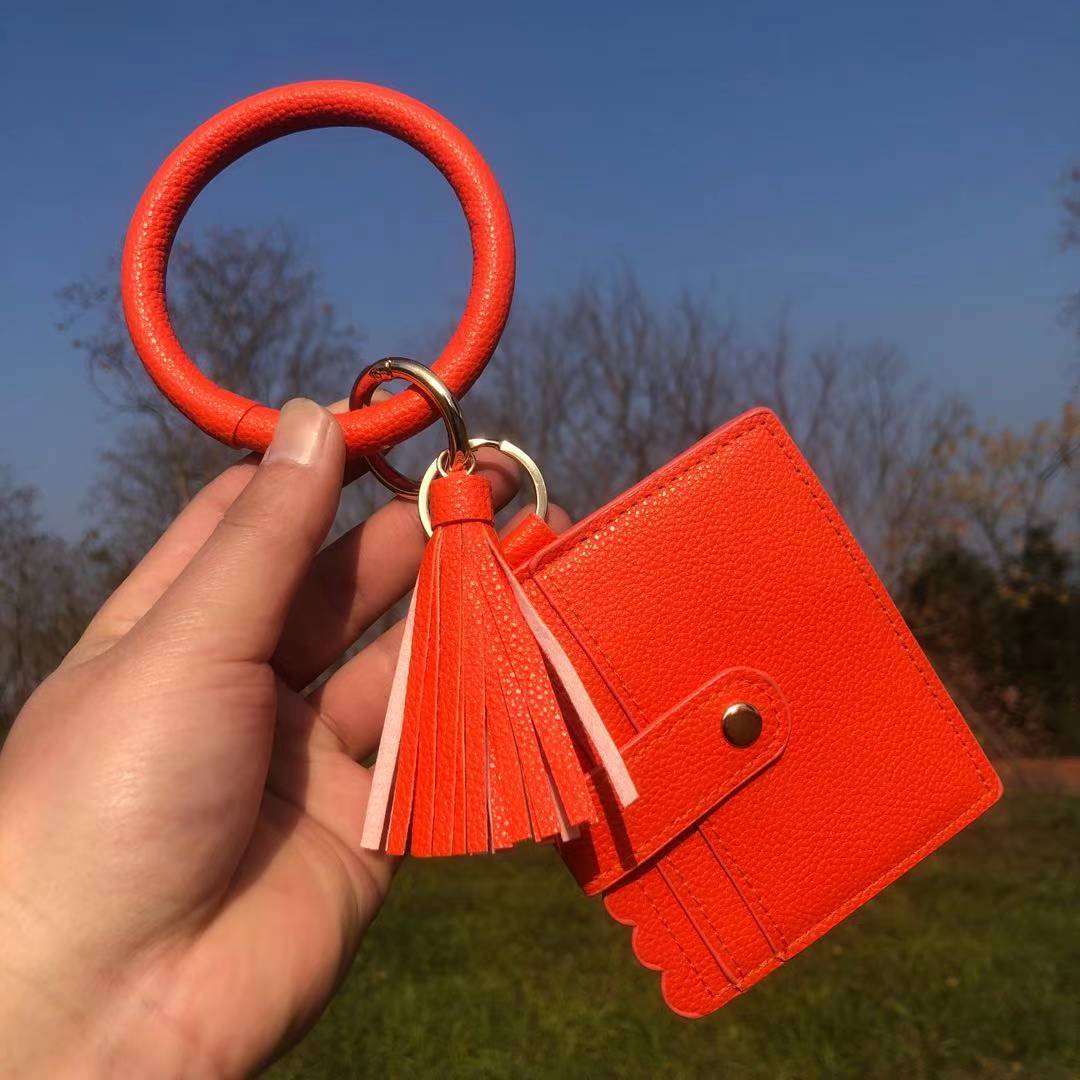 Wholesale Leopard Print PU Leather Tassel Bracelet Coin Purse Keychain