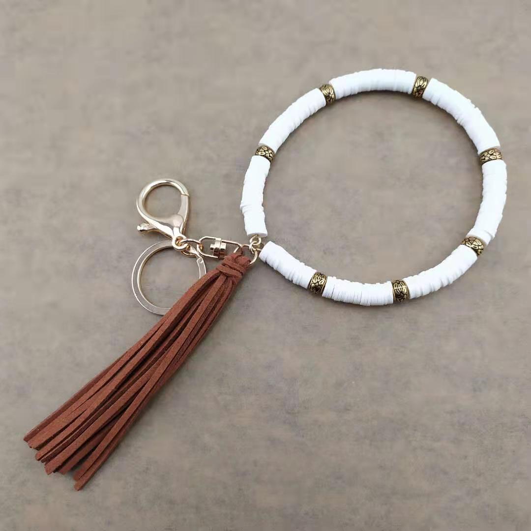 Llavero de muñeca de borla de arcilla colorida al por mayor