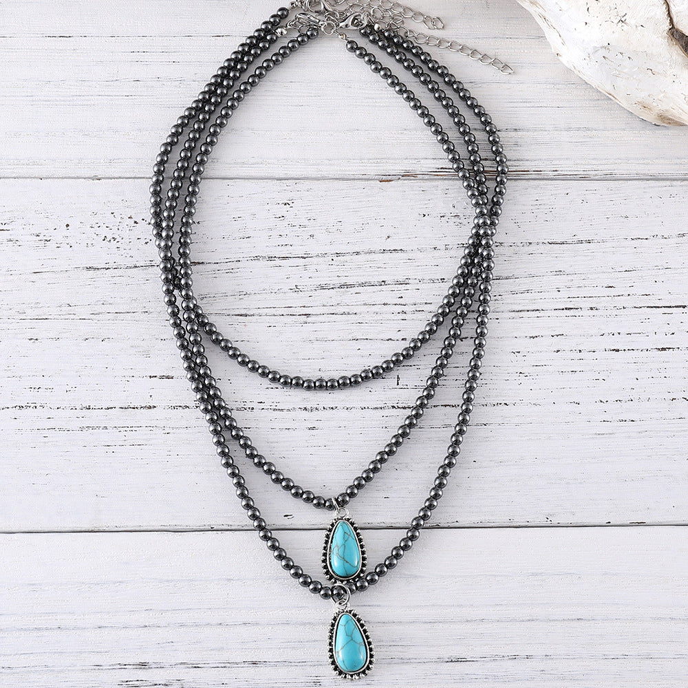 Wholesale Bohemian ethnic style three-layer teardrop-shaped turquoise black round bead necklace popular jewelry