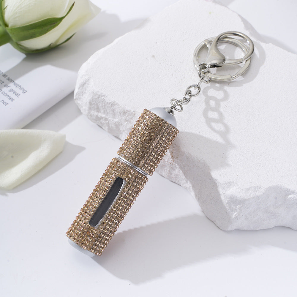 Wholesale  diamond-studded creative perfume bottle keychain is easy to carry
