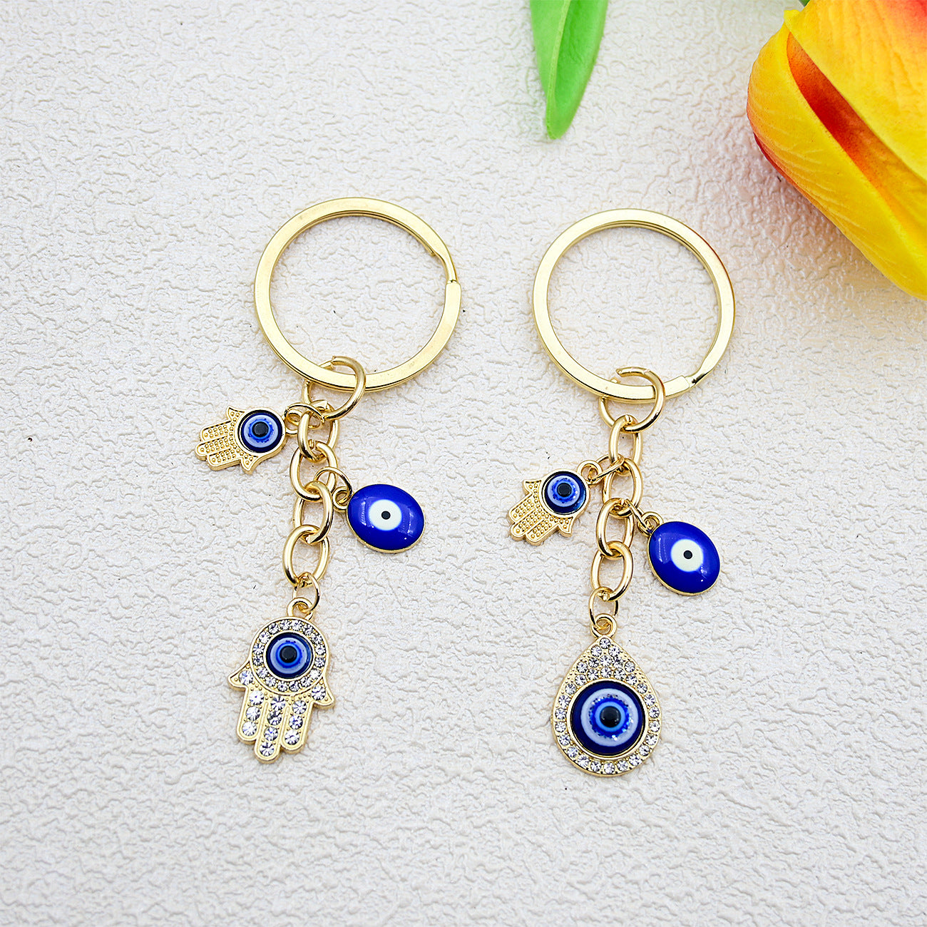 Wholesale Heart-shaped palm water droplet Devil' s eye keychain