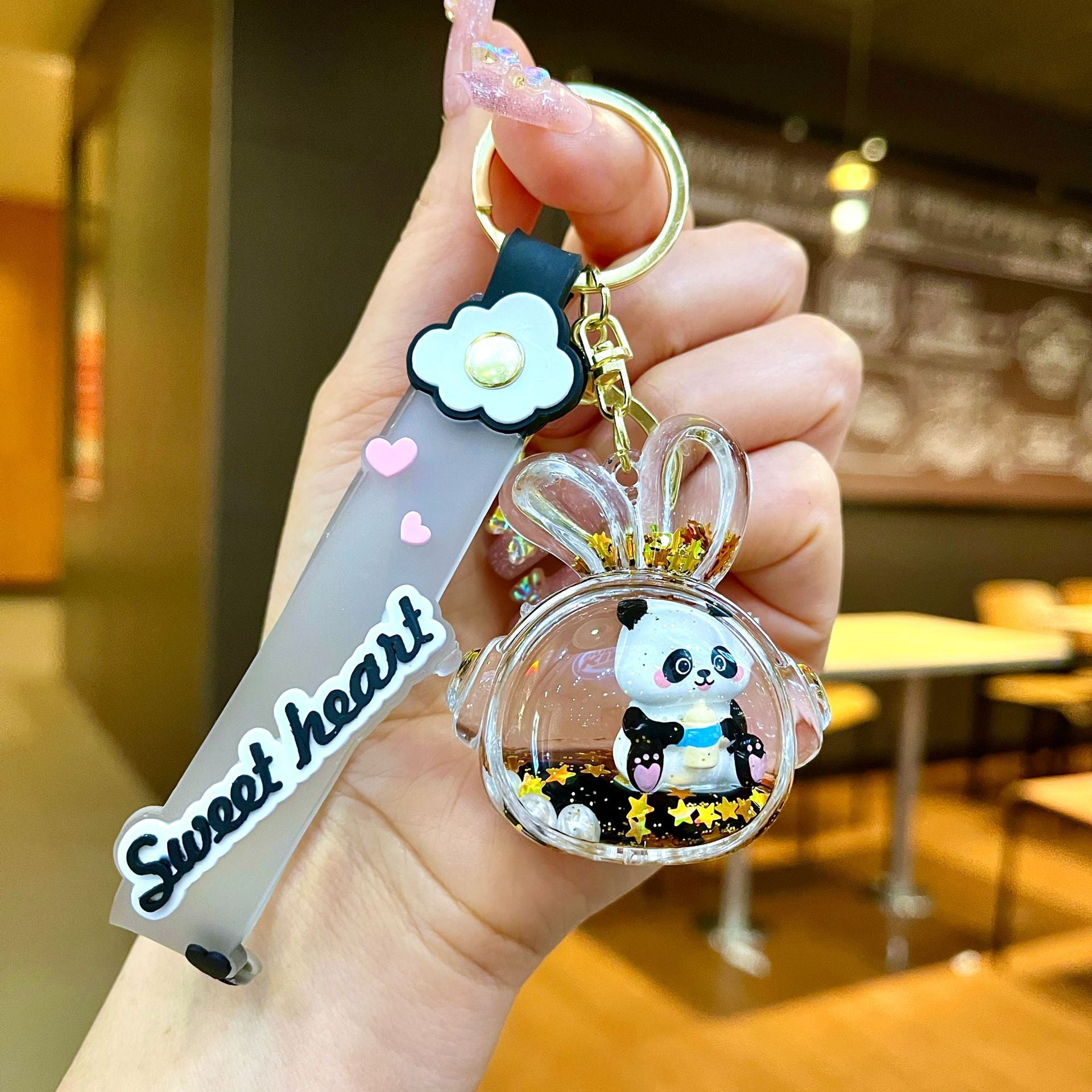 Wholesale Black gold floating cartoon cute panda Liquid Keychains