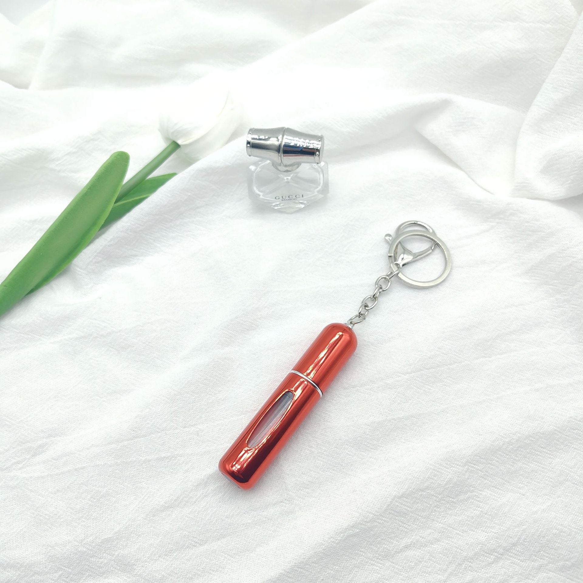 Wholesale bottom filling pump 5ml high color value sample key chain perfume bottle