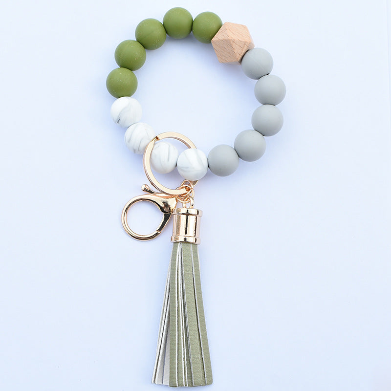 Wholesale Food Grade Silicone Beads Leather Tassel Wood Beads Bracelet Keychain