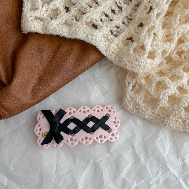 Wholesale Sweet and Cool Bow Hollow Letter Clip