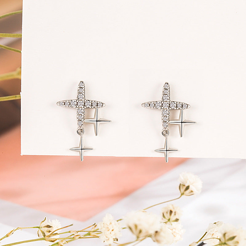 Pendientes al por mayor de cobre de diamantes estrella de cuatro puntajes