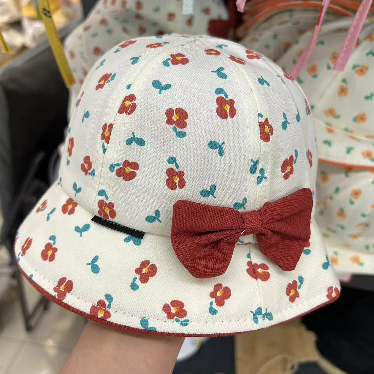 Niños al por mayor Sombrero de cubo de arco de flor de algodón