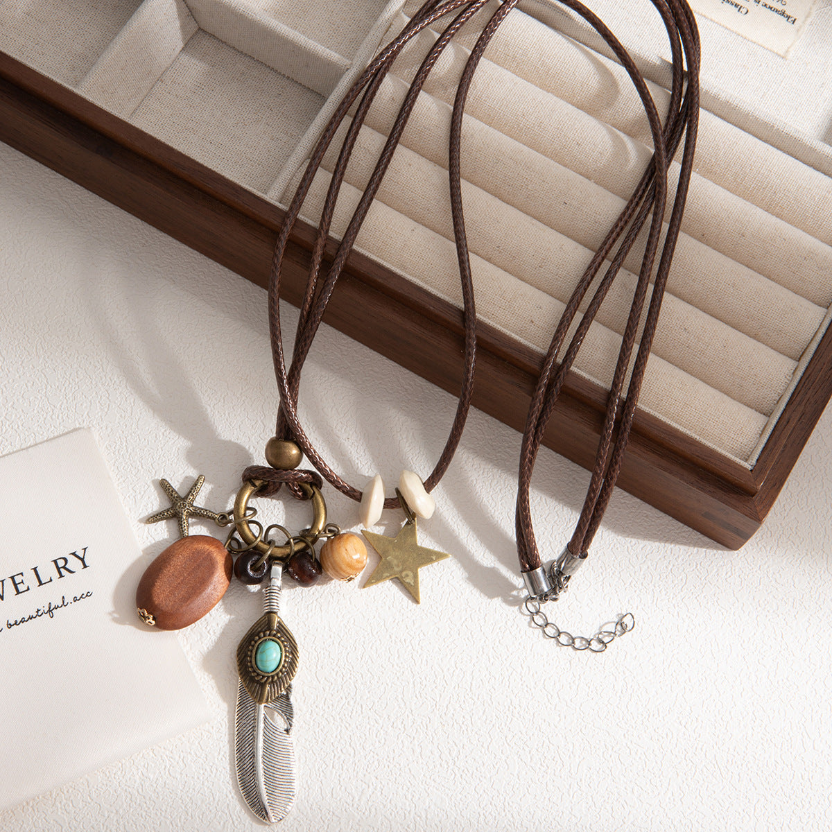 Wholesale Zen ethnic style long star beaded feather necklace