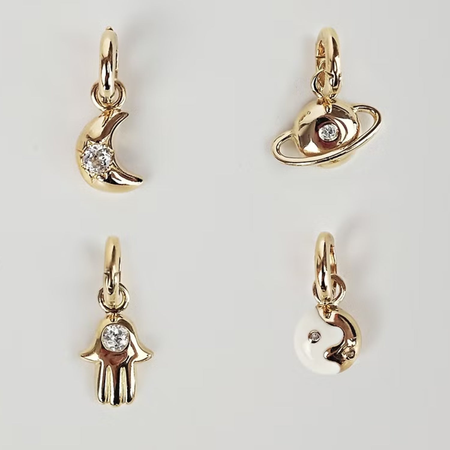 Wholesale Simple Twelve Birthstones Light Luxury Palm Moon Tai Chi Planet Gold-plated Pendant