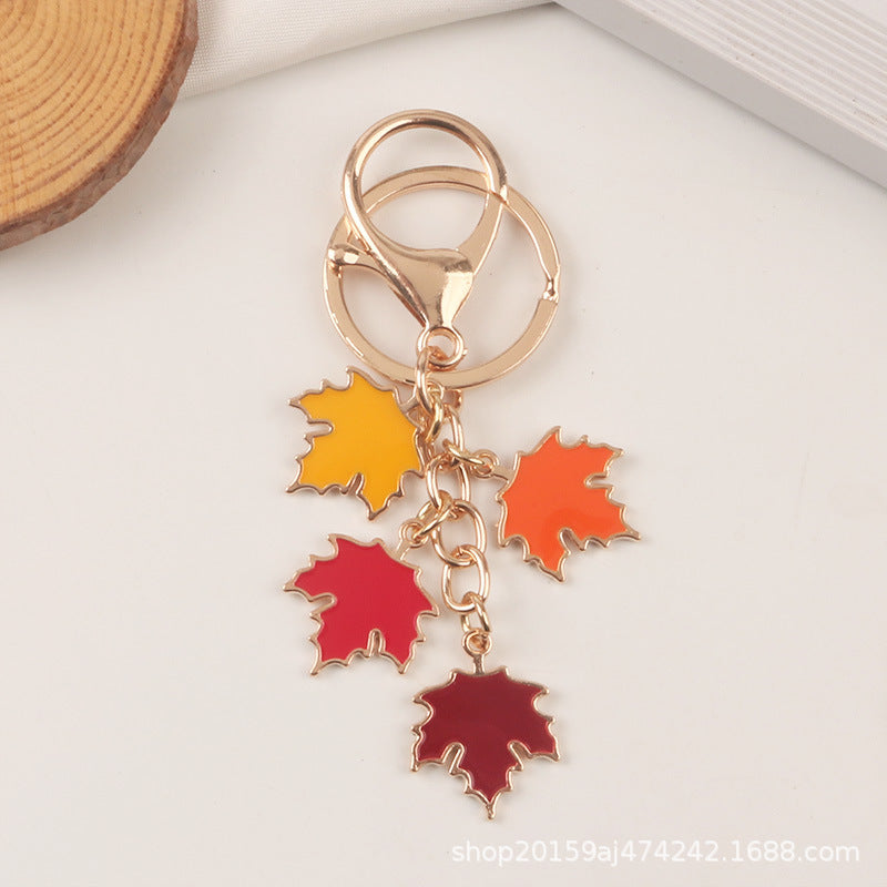 Wholesale Zinc Alloy Pearl Maple Leaf Car Keychains