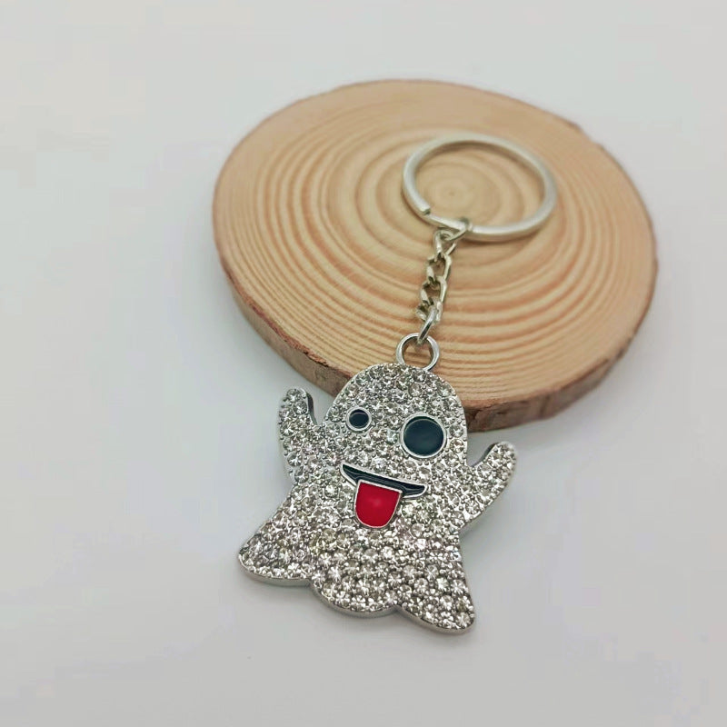 Aleación al por mayor Lengua fantasma pegado ojos de hip-hop de hip-hop con llavero de diamantes