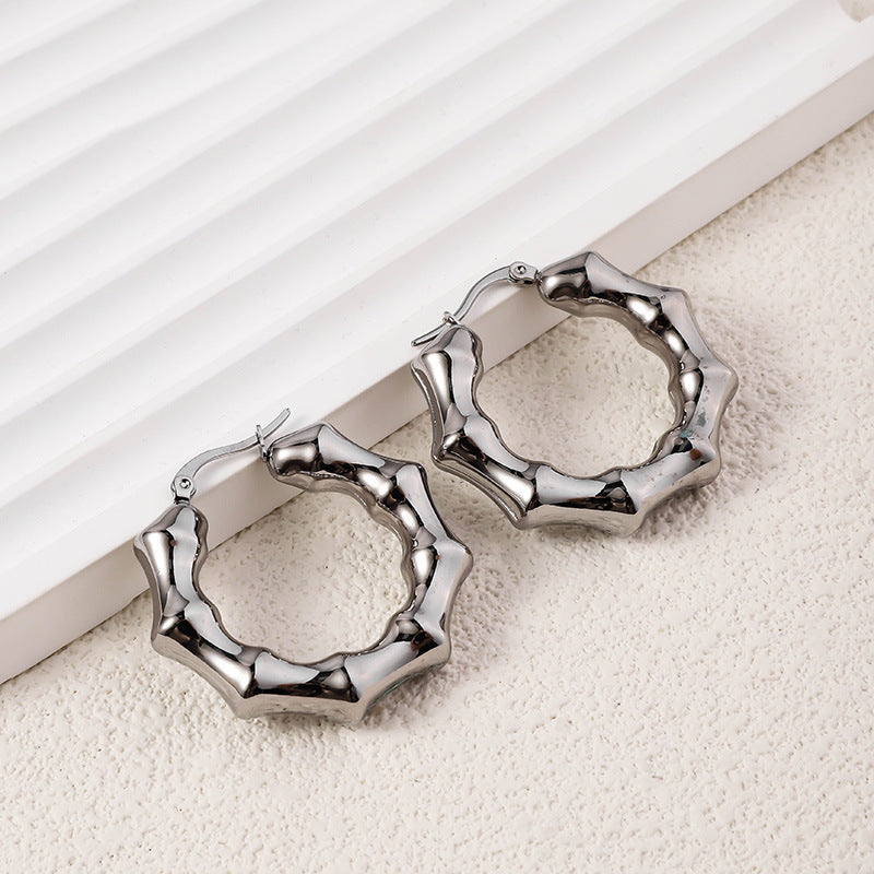 Wholesale High-end Oval Smooth Hollow Non Fading Irregular Decorated Titanium Steel Earrings