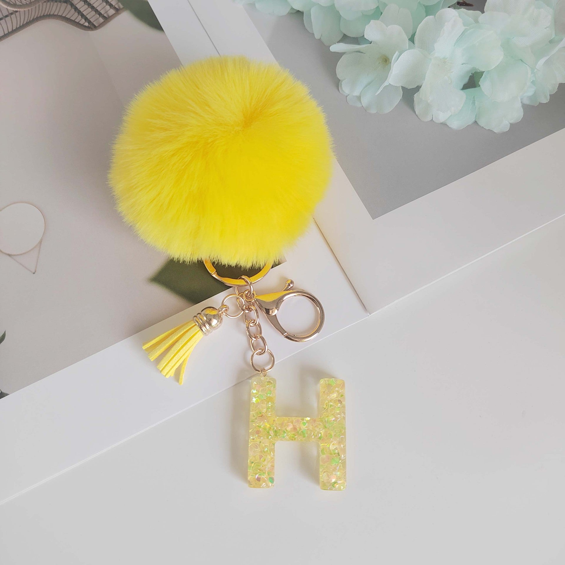 Wholesale Yellow letter ball pendant flower shaped letter keychain