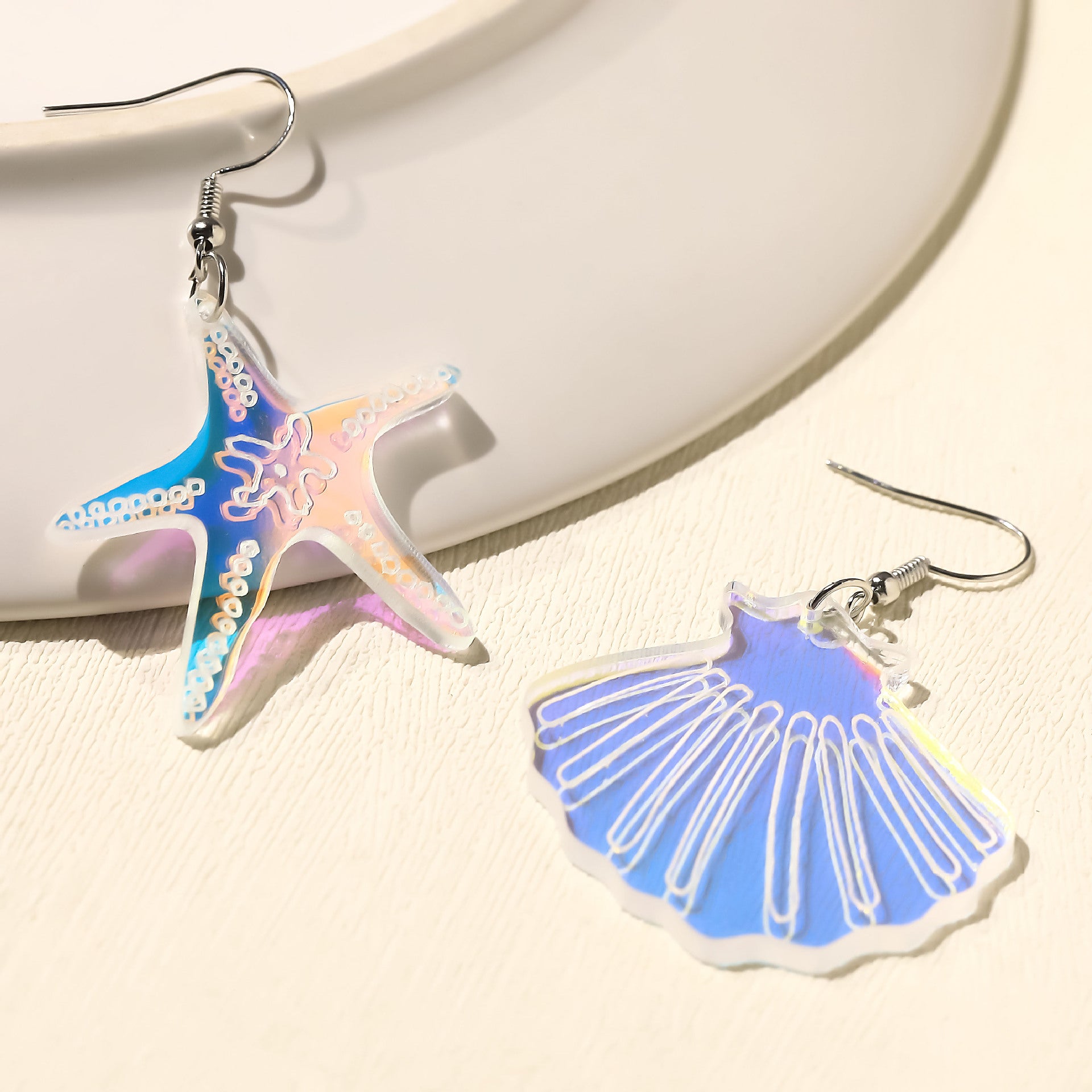 Wholesale Acrylic earrings laser starfish shell asymmetrical earrings