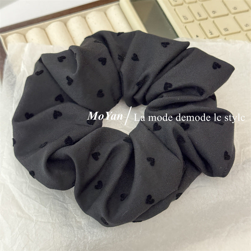 Wholesale Black polka dot bow with heart-shaped elastic headband