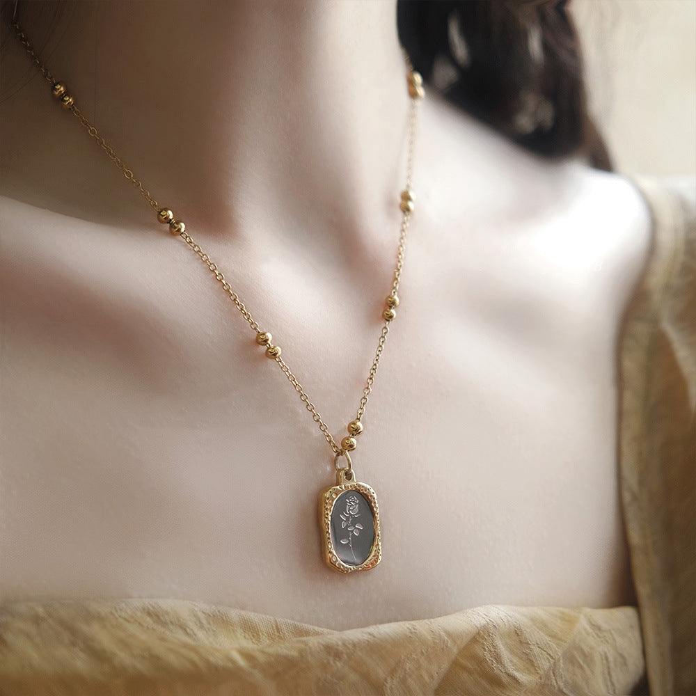 Wholesale Light Embossed Magic Mirror Rose Titanium Steel Necklace