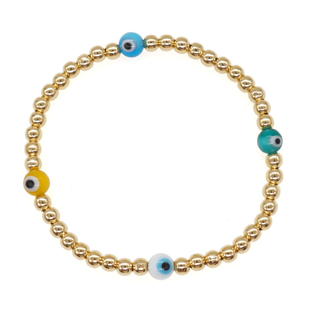 Wholesale Christmas Eyes Flower Smiley Gold Ring Buckle Elastic Glass Bracelet