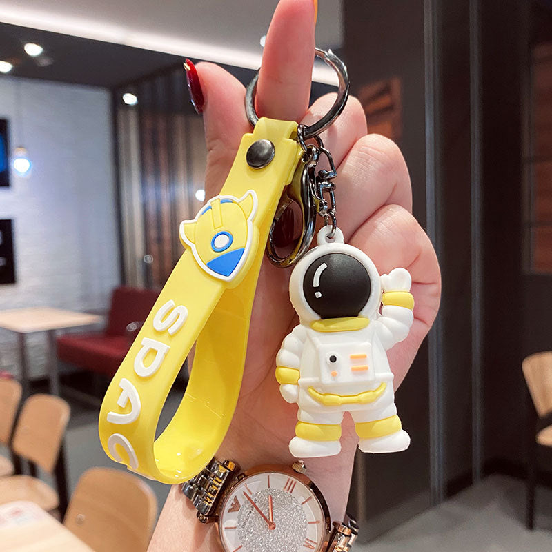 Caricatura al por mayor que ondean astronauta llaves de goma suave