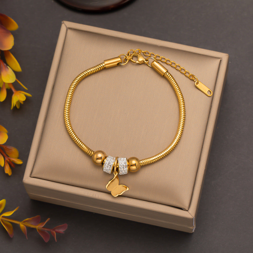 Wholesale Butterfly Eyes Flower Titanium Steel Bracelet