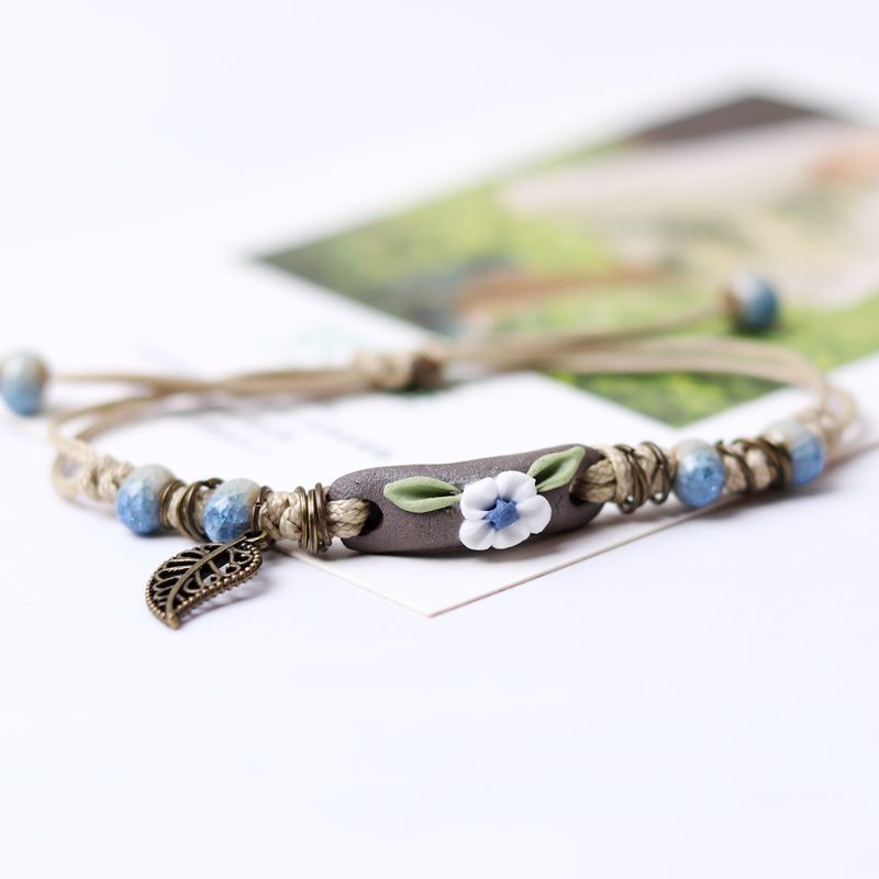 Brazalete de hoja de flores de polo de color de color arcilla al por mayor