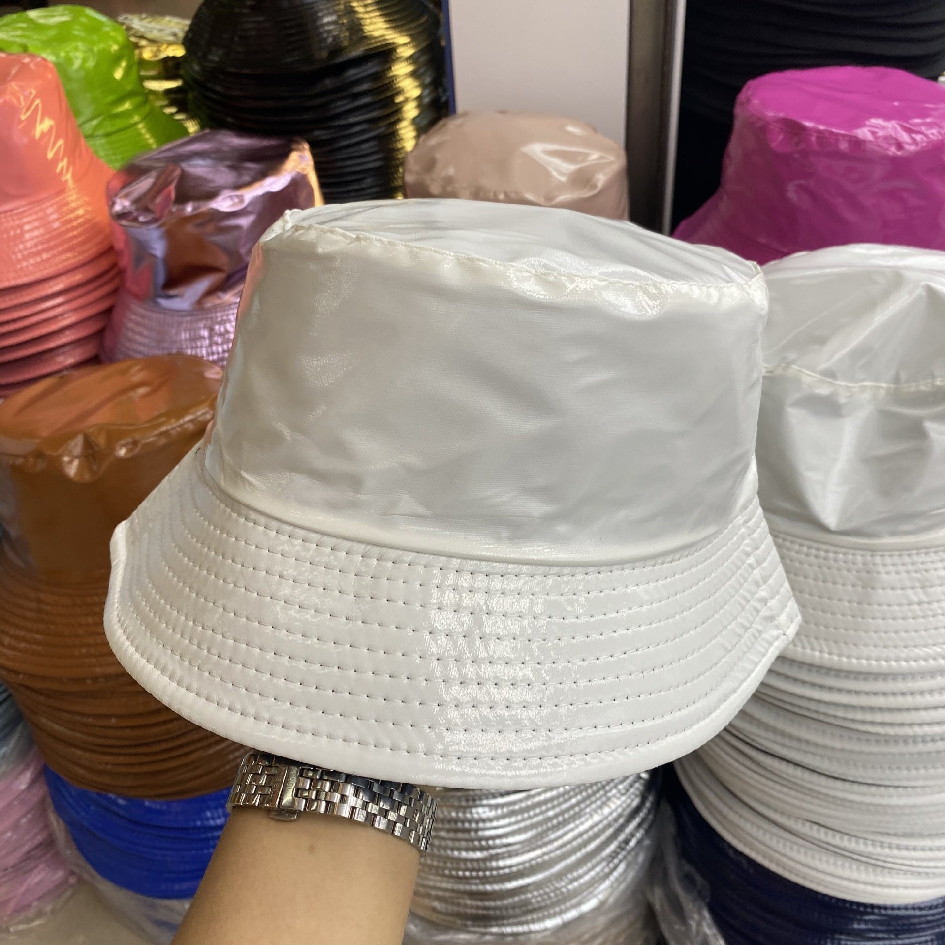 Wholesale of Solid Color Patent Leather with Polyester Fisherman Hats on Both Sides