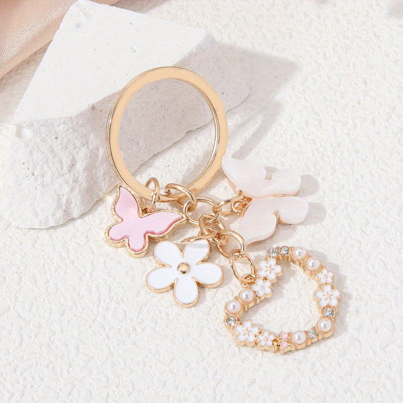 Wholesale Butterfly flower alloy keychain heart diamond small white flower pendant