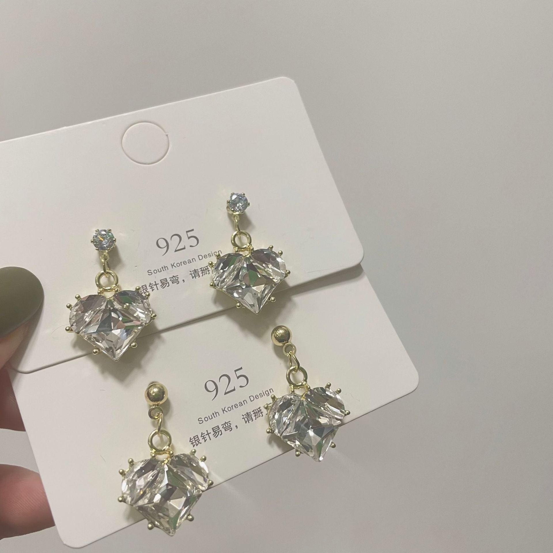 Wholesale Romantic heart-shaped peach pink earrings, fresh and sweet, simple and cool, super shiny earrings