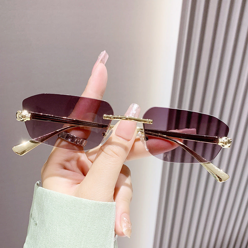 Wholesale Metal trimmed frameless polygonal cheetah decorative sunglasses
