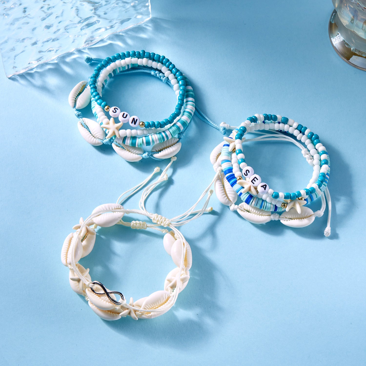 Wholesale Bohemian style conch, starfish, turtle rice bead bracelet set