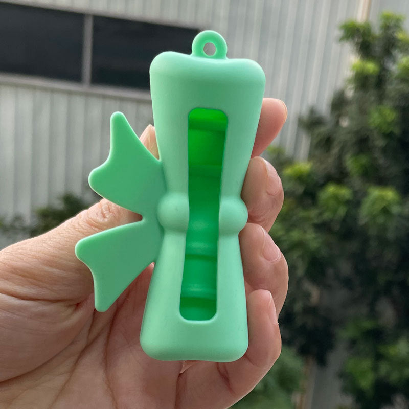 Wholesale Lipstick case silicone protective case bow lipstick bag keychain