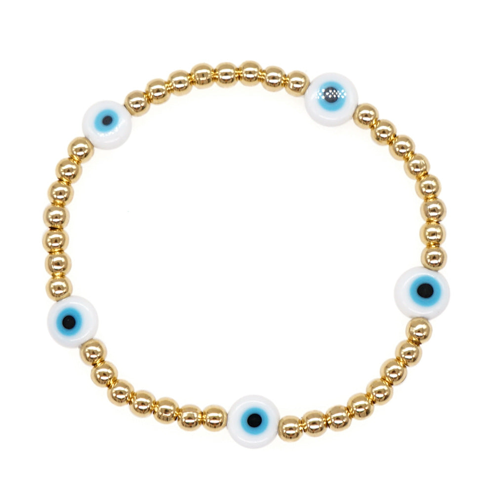 Wholesale Christmas Eyes Flower Smiley Gold Ring Buckle Elastic Glass Bracelet