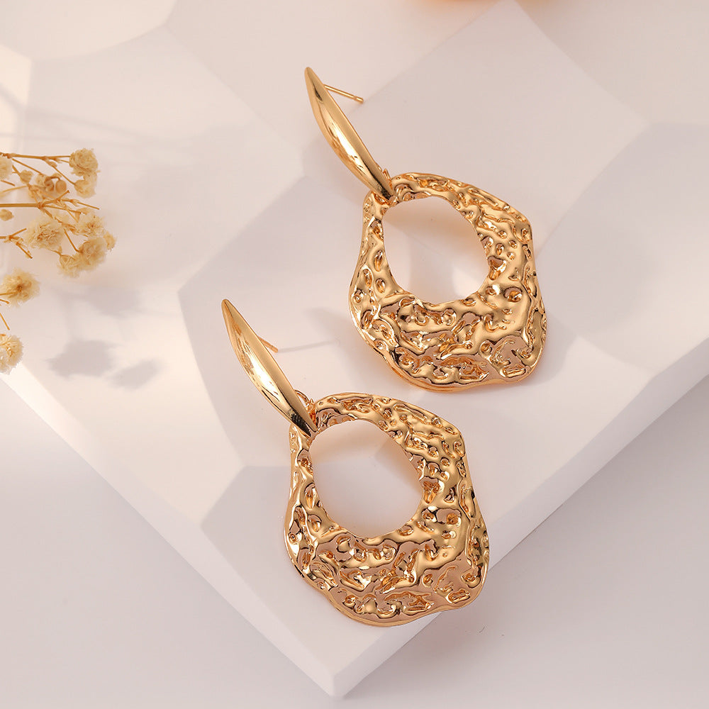 Wholesale Hollow Irregular Hammer Metal Earrings