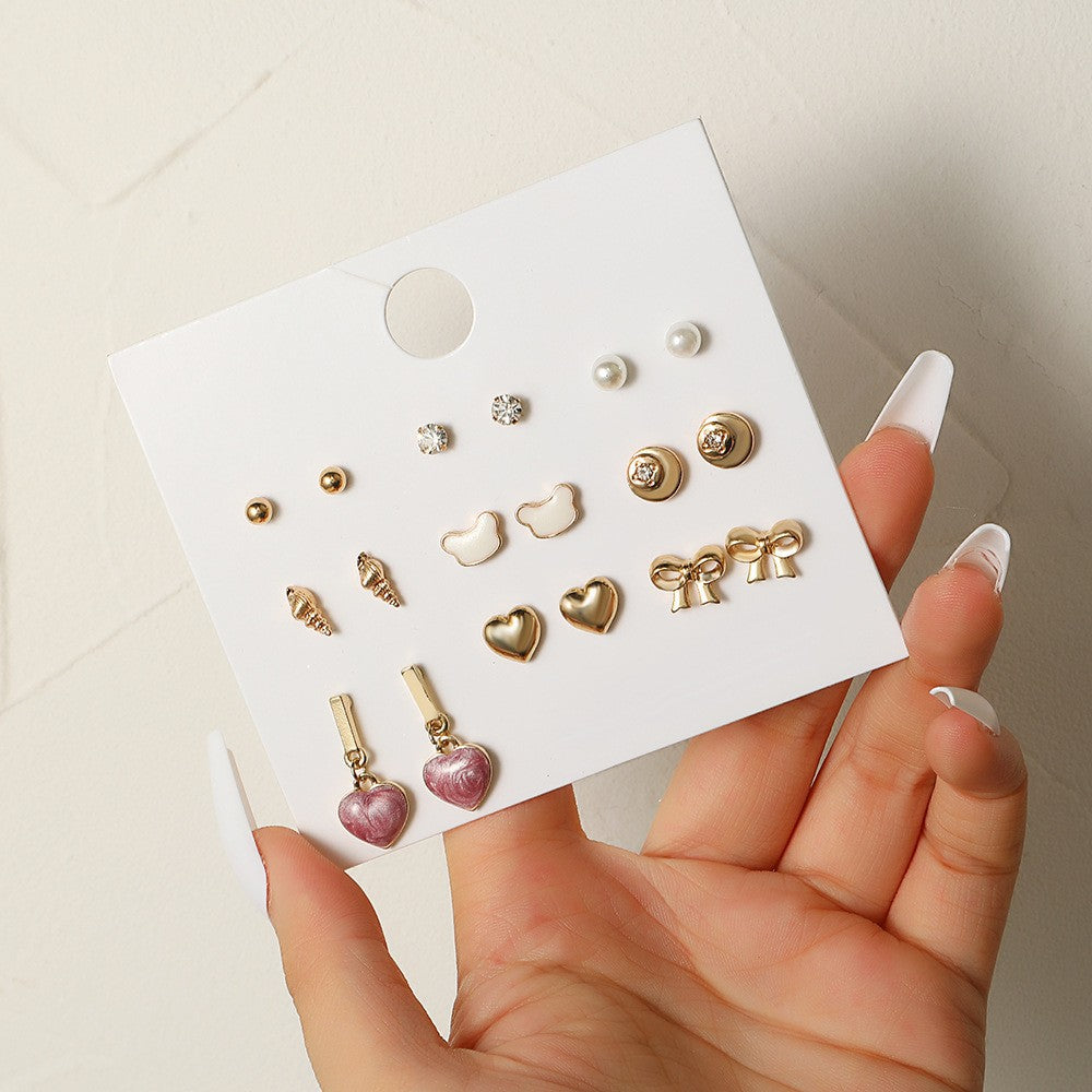 Pendientes de pernos pequeños de aleación al por mayor para pendientes de una semana