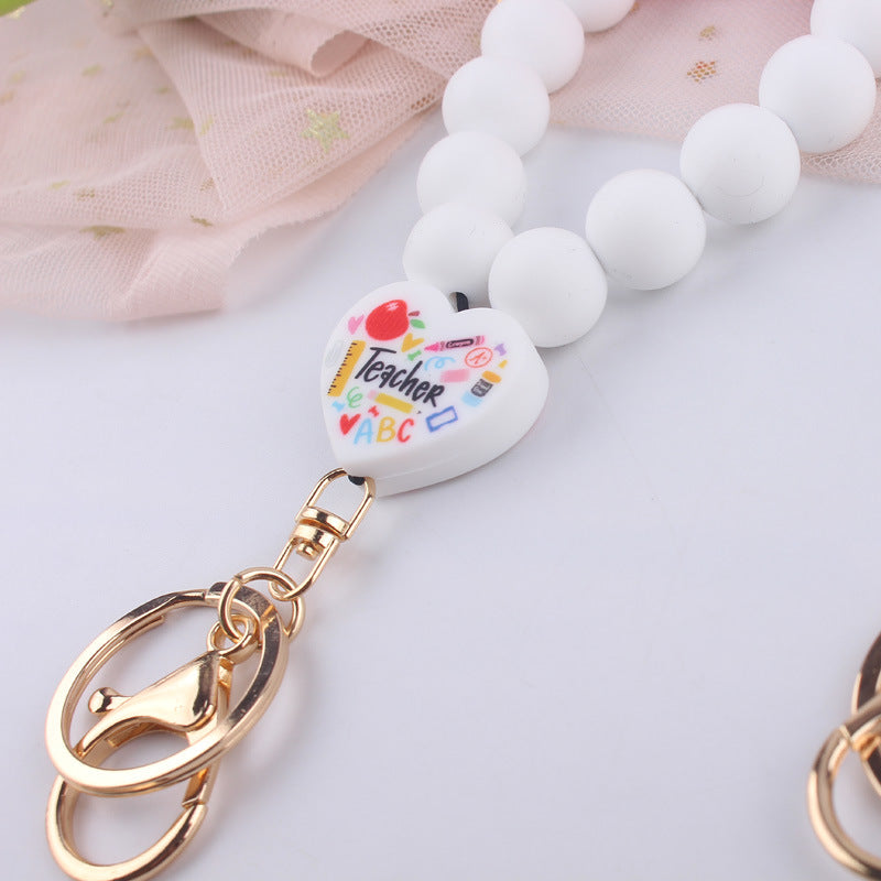 Wholesale Cartoon Love Printed Silicone Beaded Wrist Keychain