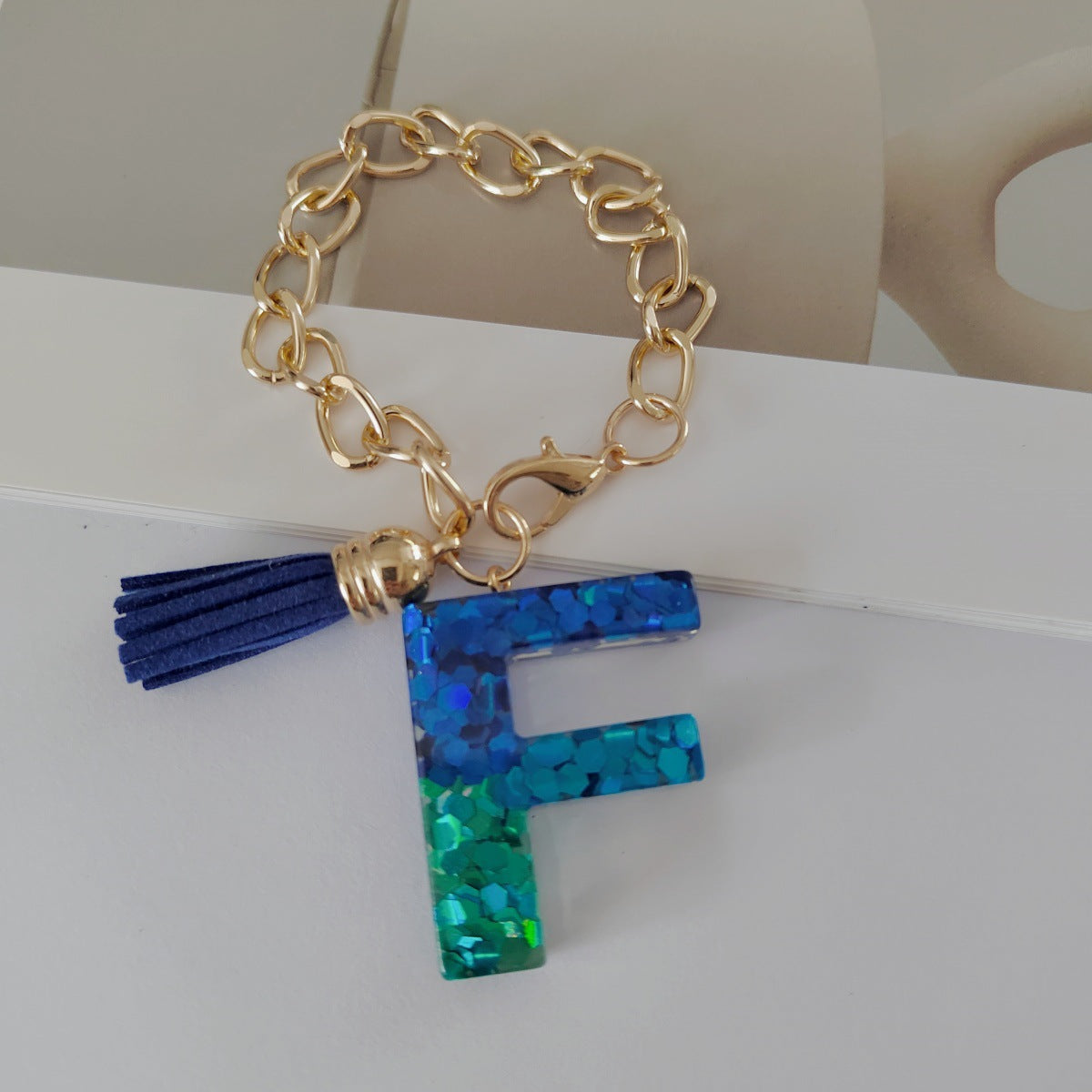 Wholesale Mixed color blue English letter keychain