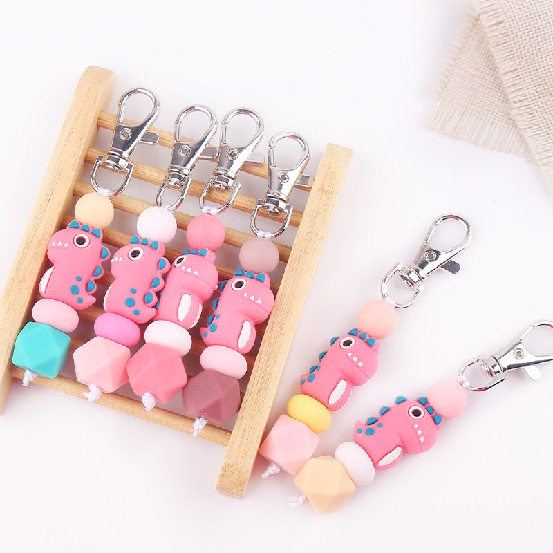 Wholesale Creative 3D Cartoon Pink Dinosaur Silicone Keychain
