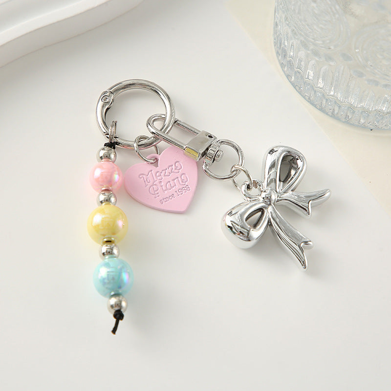 Wholesale Colored bead heart shaped bow metal keychain