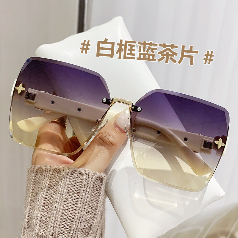 Wholesale Frameless Trimmed Trendy Sunglasses