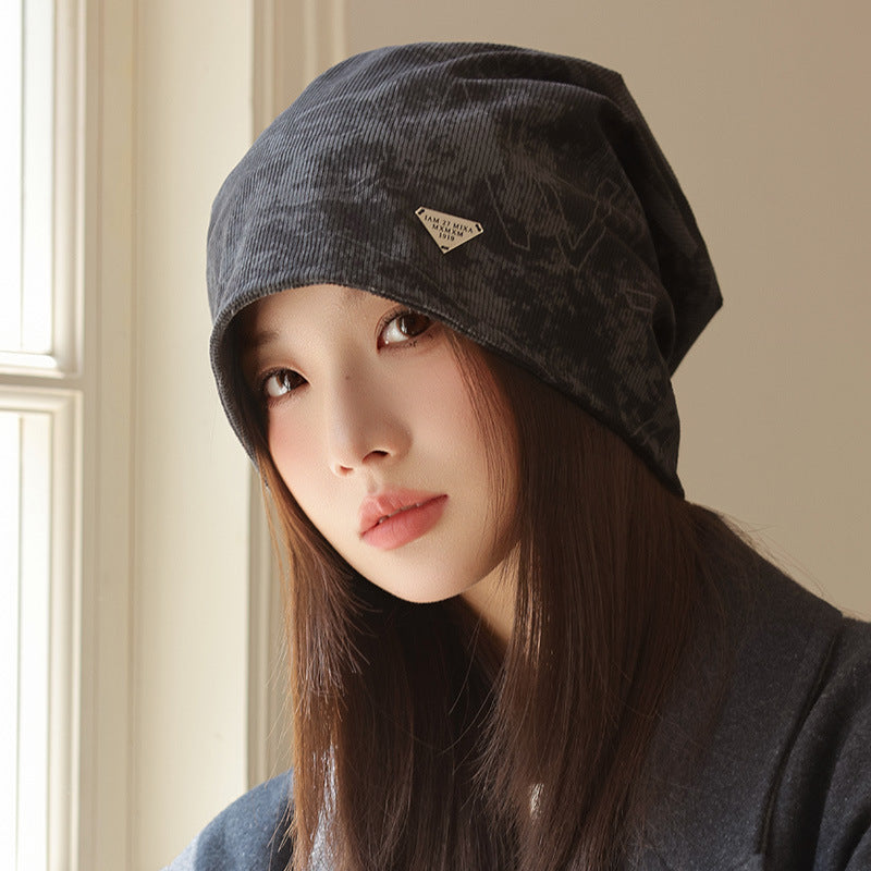 Wholesale New autumn and winter printed pile hats,  windproof and face-revealing small bun hats,  warm cold hats