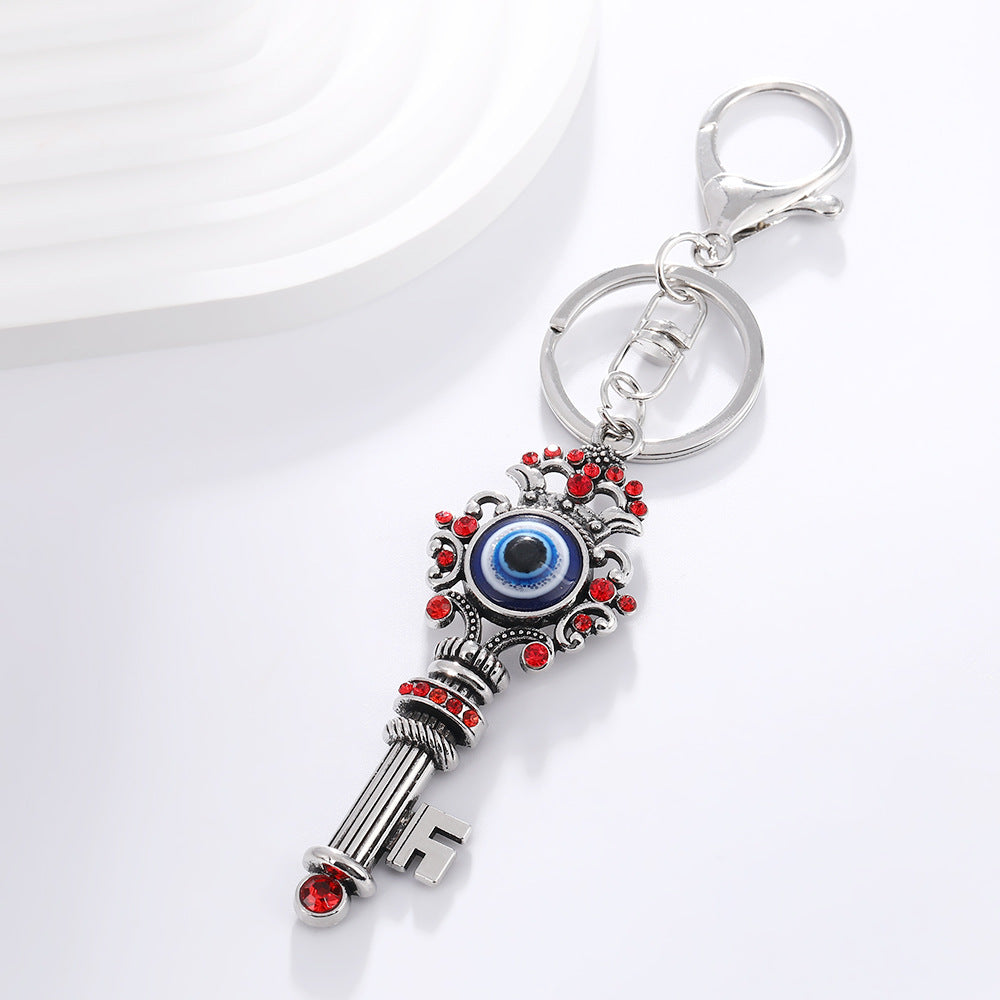 Wholesale Devil' s Eye Key Shape with Water Diamond Metal Keychain