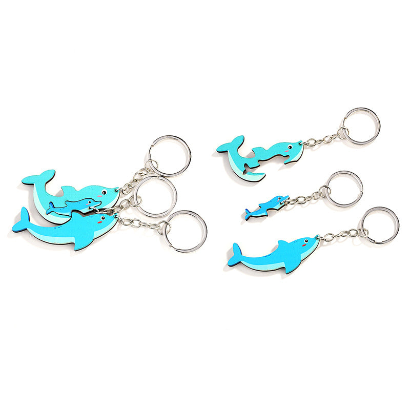 Wholesale of Cute Three Little Dolphins Wooden Parent-child Keychain