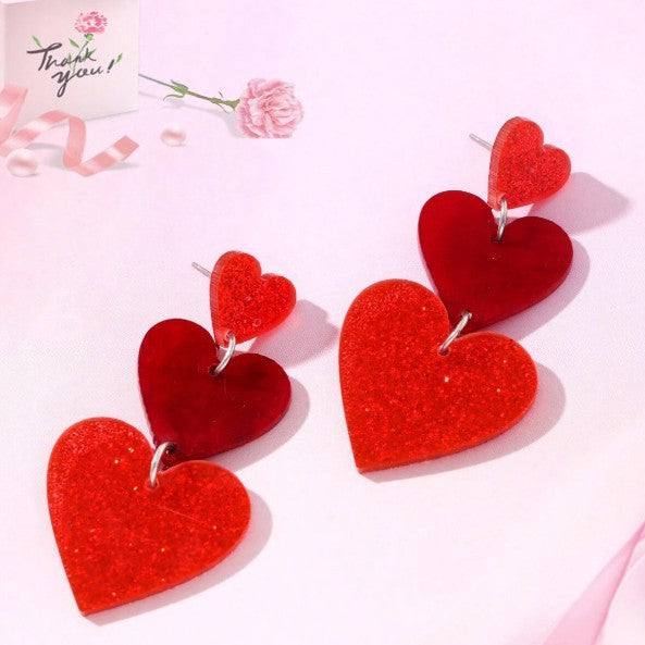 Wholesale  Heart-shaped Stud Earrings With a Triple Dangle Design.