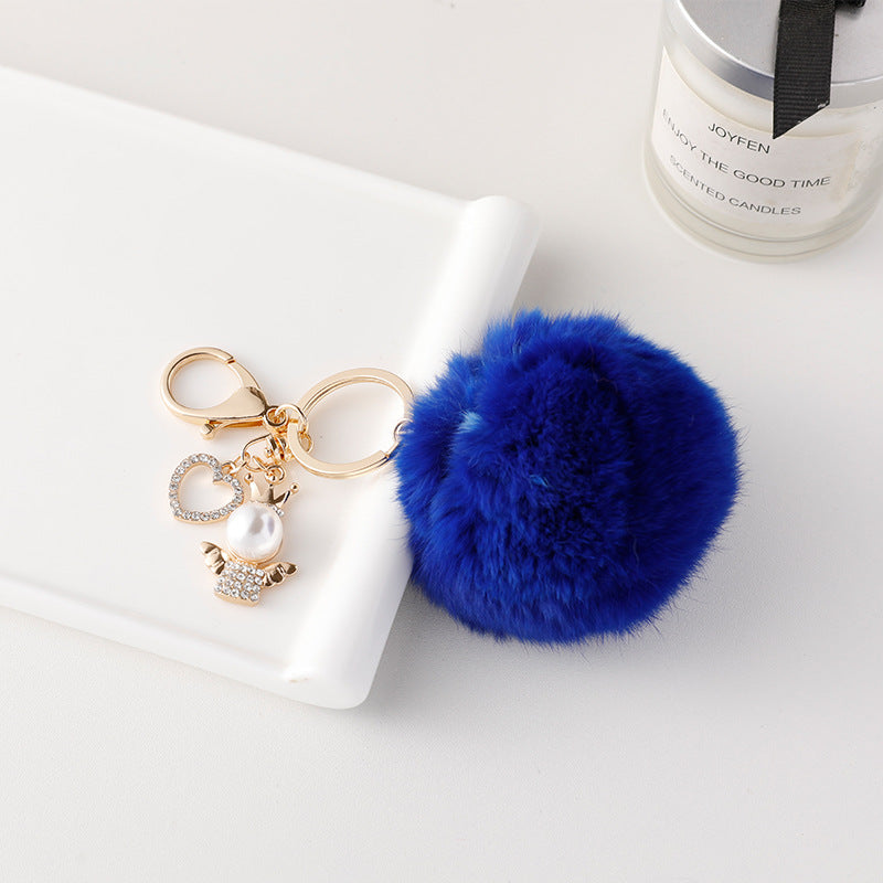 Wholesale of Cute Diamond Inlaid Angel Fur Ball Metal Keychains