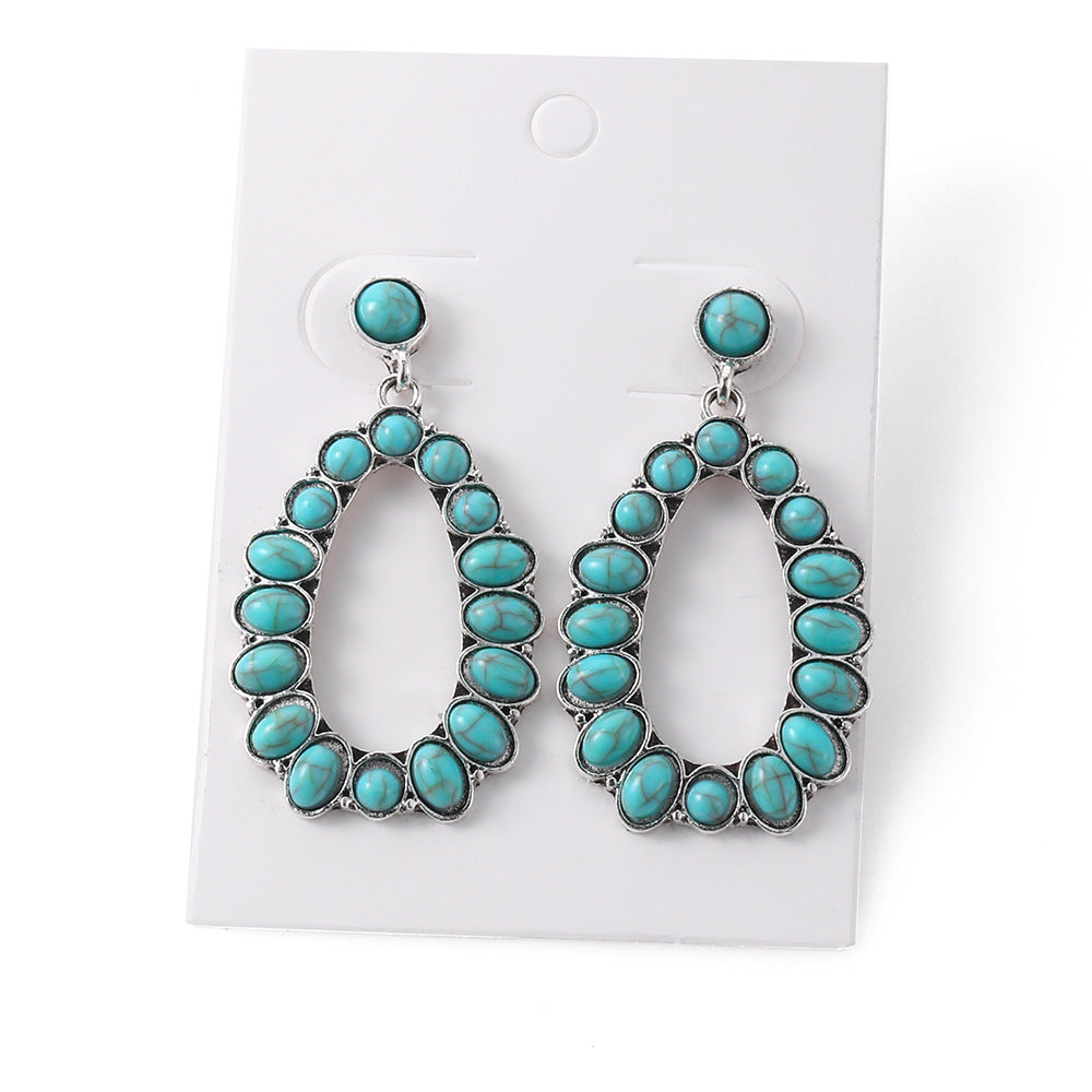 Wholesale Exaggerated retro oval turquoise teardrop-shaped hollow earrings