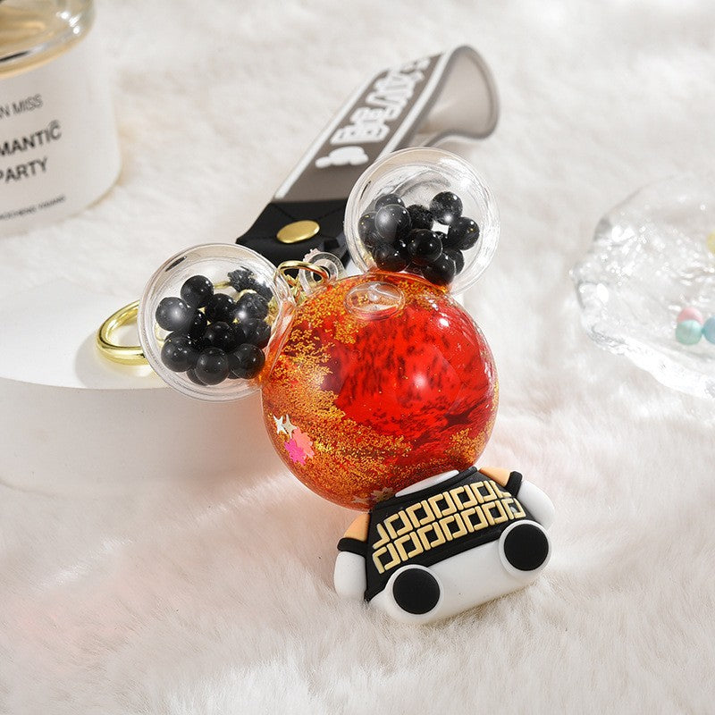 Wholesale Acrylic flowing sand bottle bag keychain