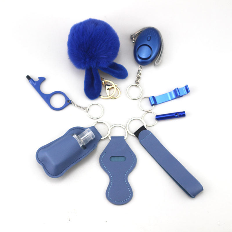 Wholesale Outdoor Whistle Hand Sanitizer Leather Case Fur Ball Key Chain Set