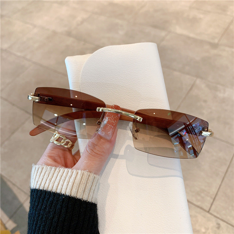 Wholesale Frameless faux wood grain temple sunglasses